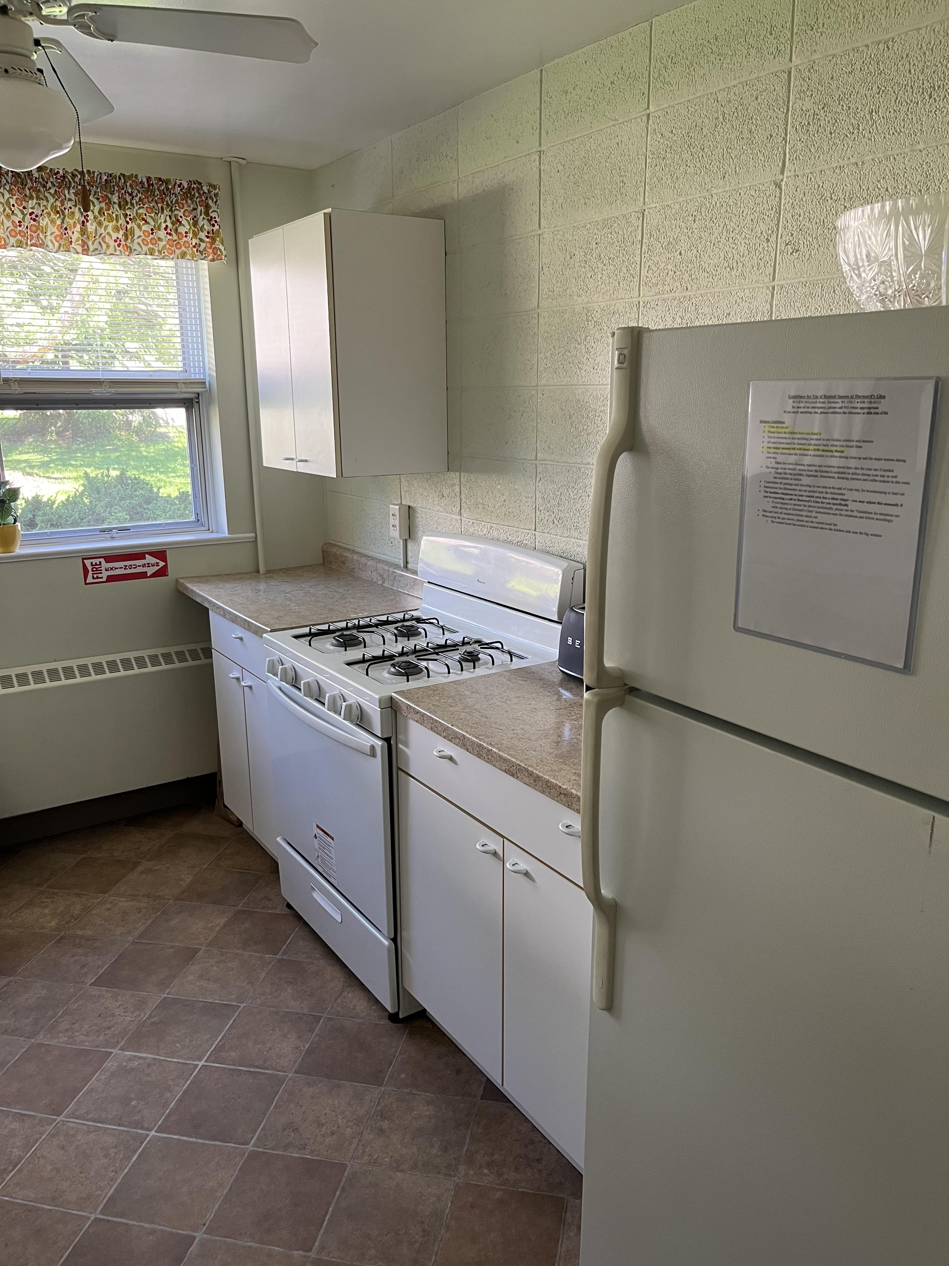 South Wing kitchenette with stove and refrigerator